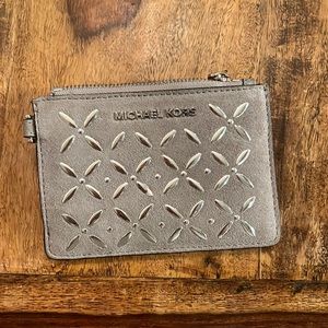 gray and sliver Michael Kors coin/card holder.